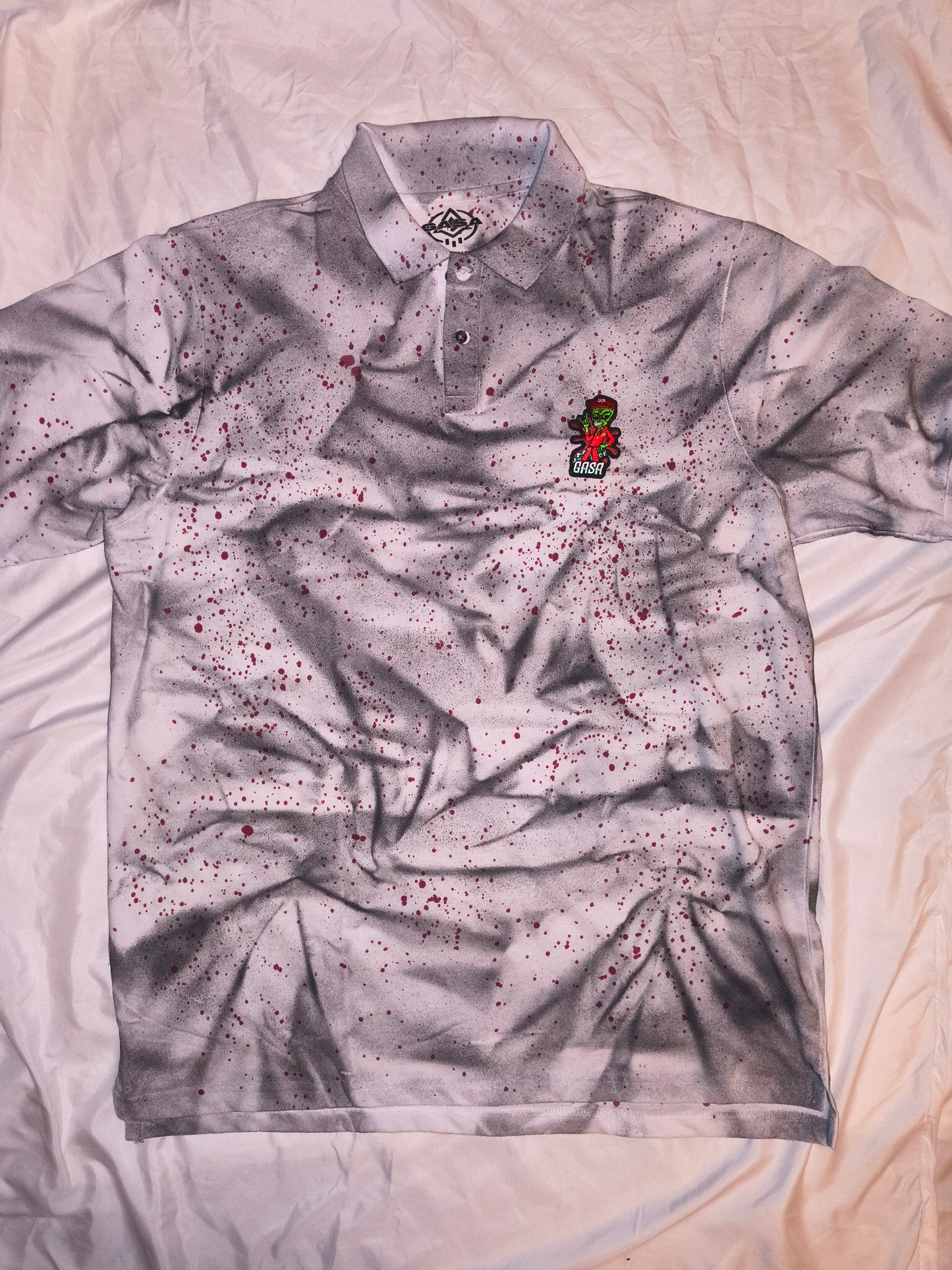 GASA dripping Aurora's polo