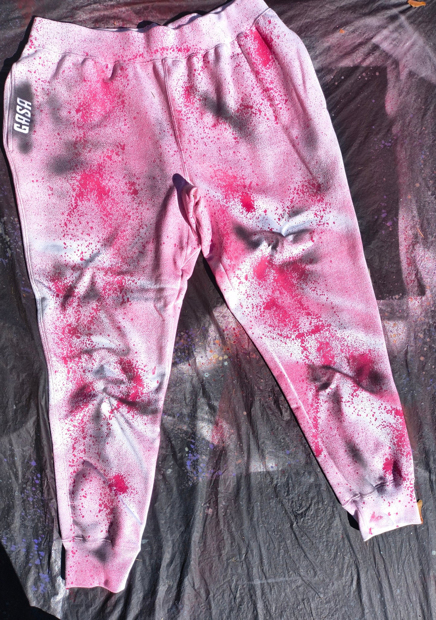 GASA dripping Aurora's sweat pants